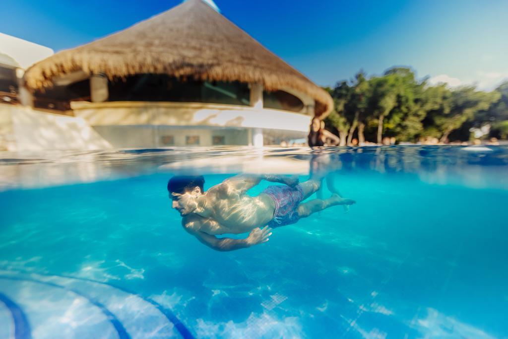 מלון פלאייה דל כרמן Occidental At Xcaret Destination מראה חיצוני תמונה Swimming in a pool